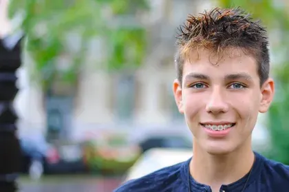 Boy Smiling with Braces