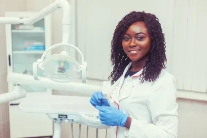 Dentist Smiling in Office