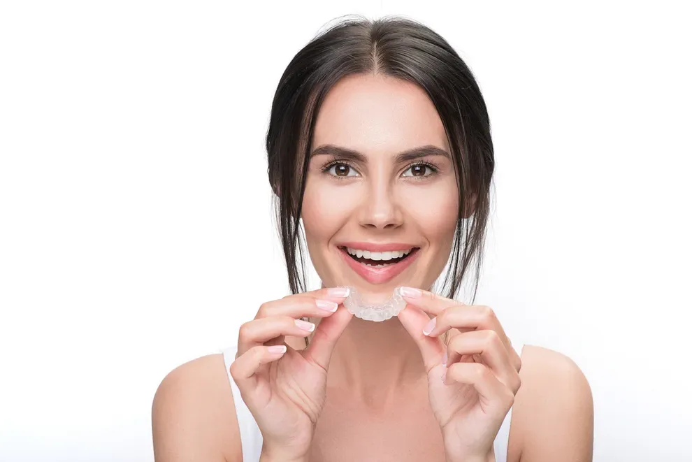 woman-before-bed-teeth-aligners