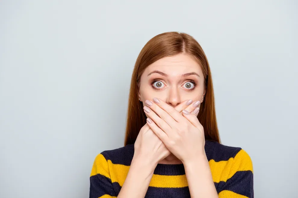 woman-covering-mouth-bad-breath