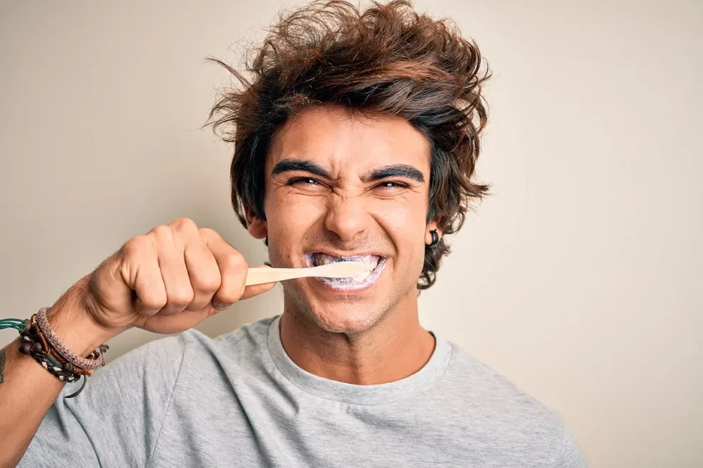 young-adult-brushing-teeth